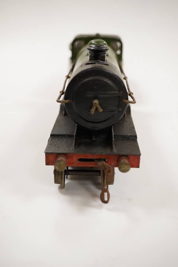 An 0 gauge Bing (or possibly Carette) for Bassett-Lowke tinplate clockwork GNR 4-4-2 tender locomotive, 1442, with original clockwork mechanism in yellow and black lined green livery